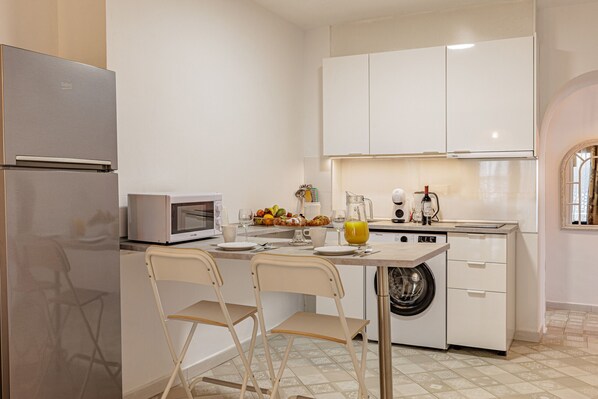 Fridge, microwave, coffee/tea maker, electric kettle