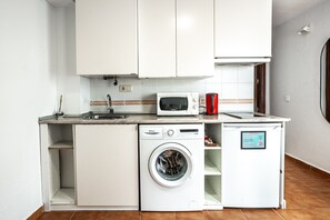 Fridge, microwave, coffee/tea maker, electric kettle