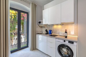 Fridge, microwave, coffee/tea maker, electric kettle