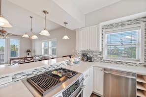 Fridge, microwave, oven, stovetop - Three story townhome. Garage access. Golf cart included. Very short drive to the (Port Aransas)