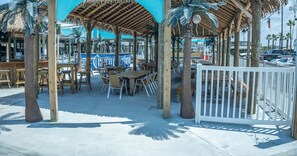 Outdoor dining - 4B/3B Waterfront home with large patio, private hot tub, and fishing lights (Galveston)