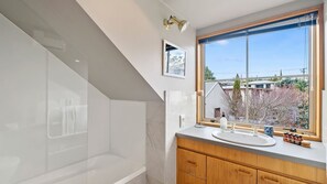 Bathtub, hair dryer, towels