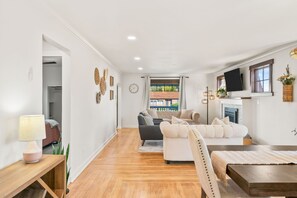 Smart TV, fireplace, books