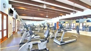 A gym with multiple treadmills and exercise equipment. - Perfect View, Convenient and Peaceful King Casita at Legacy Villas (La Quinta)