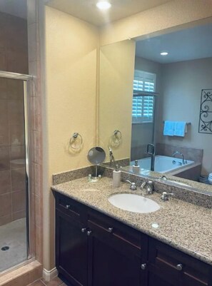 Bathtub, hair dryer, towels, soap