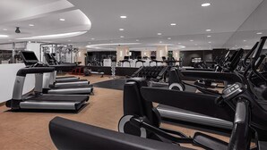 A modern gym with multiple treadmills, weight machines, and cardio equipment. - 1BR Villa Walk to Las Vegas Strip - Marriott Grand Chateau - Full Kitchen + Pool (Las Vegas)