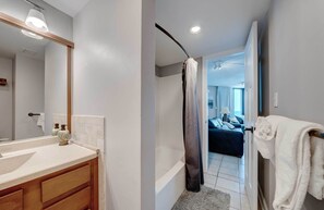 Combined shower/bathtub, hair dryer, towels, soap