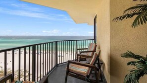 A balcony with a view of a beach and ocean. - Gulf-Front Condo, Balcony, 3 Pools, 1 Heated (Panama City Beach)