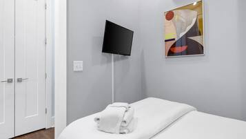 2 bedrooms, desk, iron/ironing board, travel crib