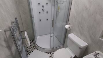 Shower, towels, soap, shampoo