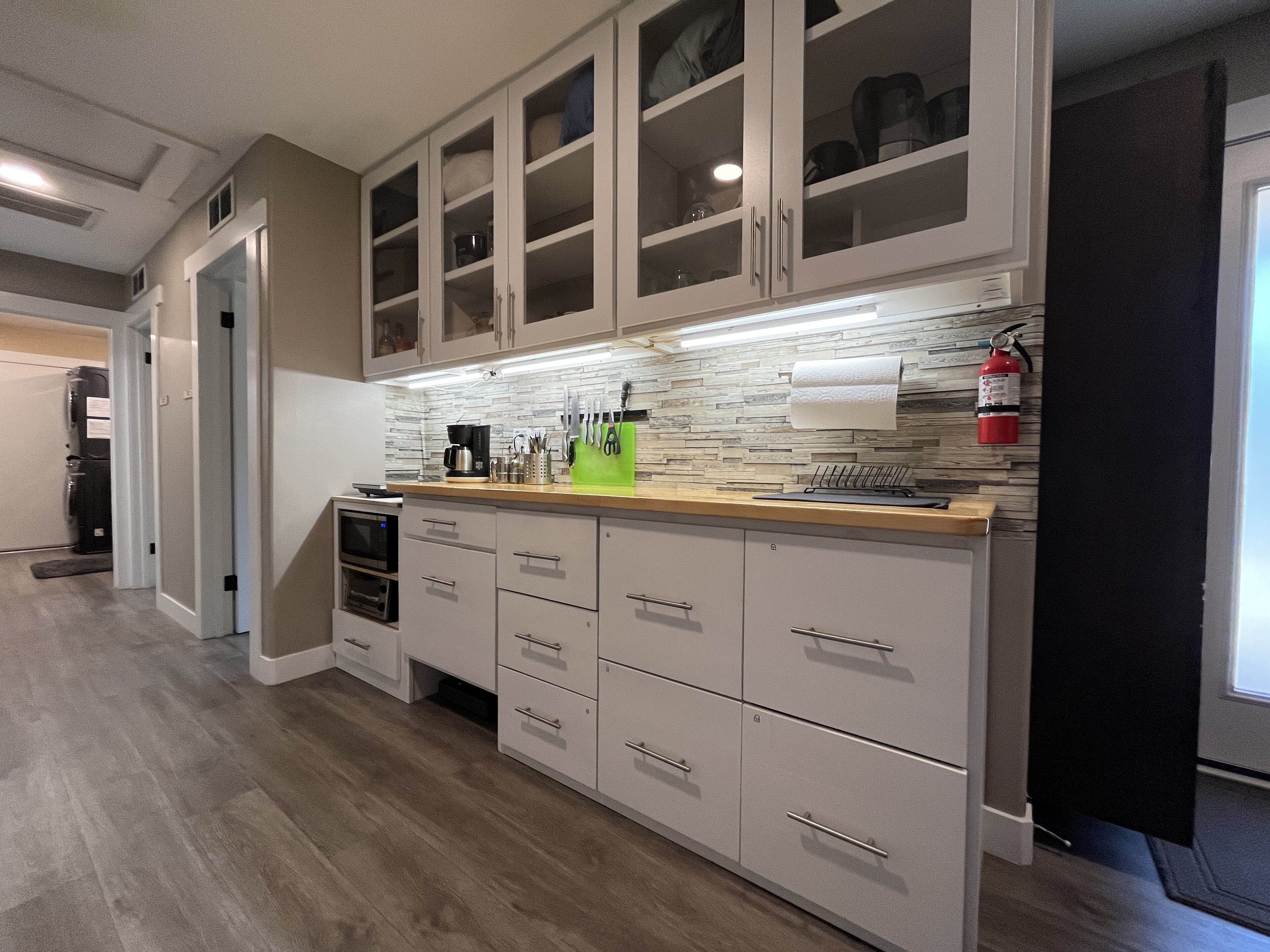 Fridge, microwave, stovetop, coffee/tea maker