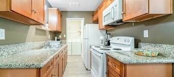 Longer Stay for Travelers Blocks from Hospital and Downtown Security Gates