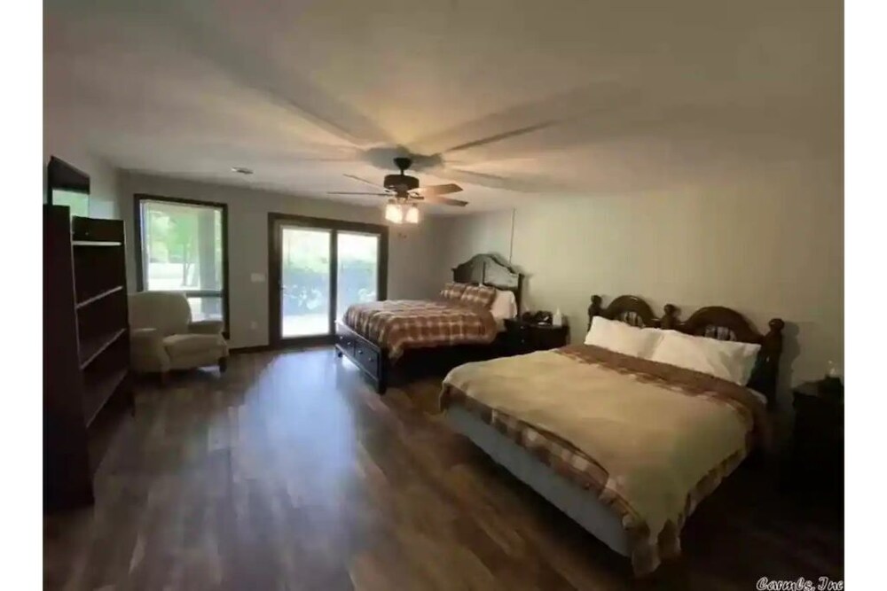 Riverfront Lodge on 10 Acres with Large Dock Flippin Vrbo