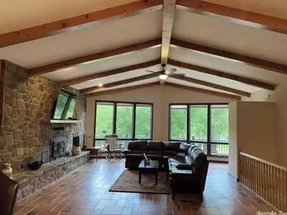 Riverfront Lodge on 10 Acres with Large Dock