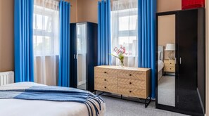 Apartamento, várias camas | 2 quartos, ferros/tábuas de passar roupa, Wi-Fi de cortesia