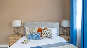 Apartamento, várias camas | 2 quartos, ferros/tábuas de passar roupa, Wi-Fi de cortesia
