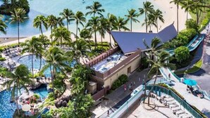 A resort with a beach, pool area, and ocean view. - 1438 · Ilikai collection # 8. Beach Views and great value (Honolulu)