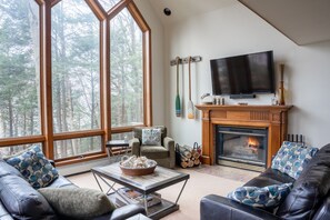 Televisión, reproductor de DVD, libros y videoteca 