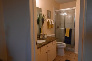 Combined shower/bathtub, hair dryer, towels, soap