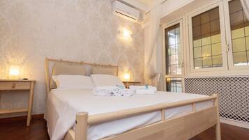 Habitación Deluxe | Escritorio, wifi gratis, ropa de cama