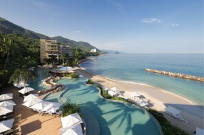On the beach, sun loungers, beach towels