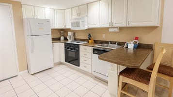Condo, 2 Bedrooms, Jetted Tub | Private kitchen | Full-size fridge, oven, coffee/tea maker, toaster