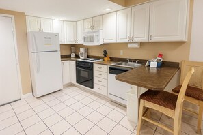 Condo, 2 Bedrooms, Jetted Tub | Private kitchen | Full-size fridge, oven, coffee/tea maker, toaster