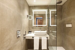 Suite, Non Smoking | Bathroom | Shower, rainfall showerhead, eco-friendly toiletries, hair dryer - Radisson Hotel Ferrara (Ferrara)