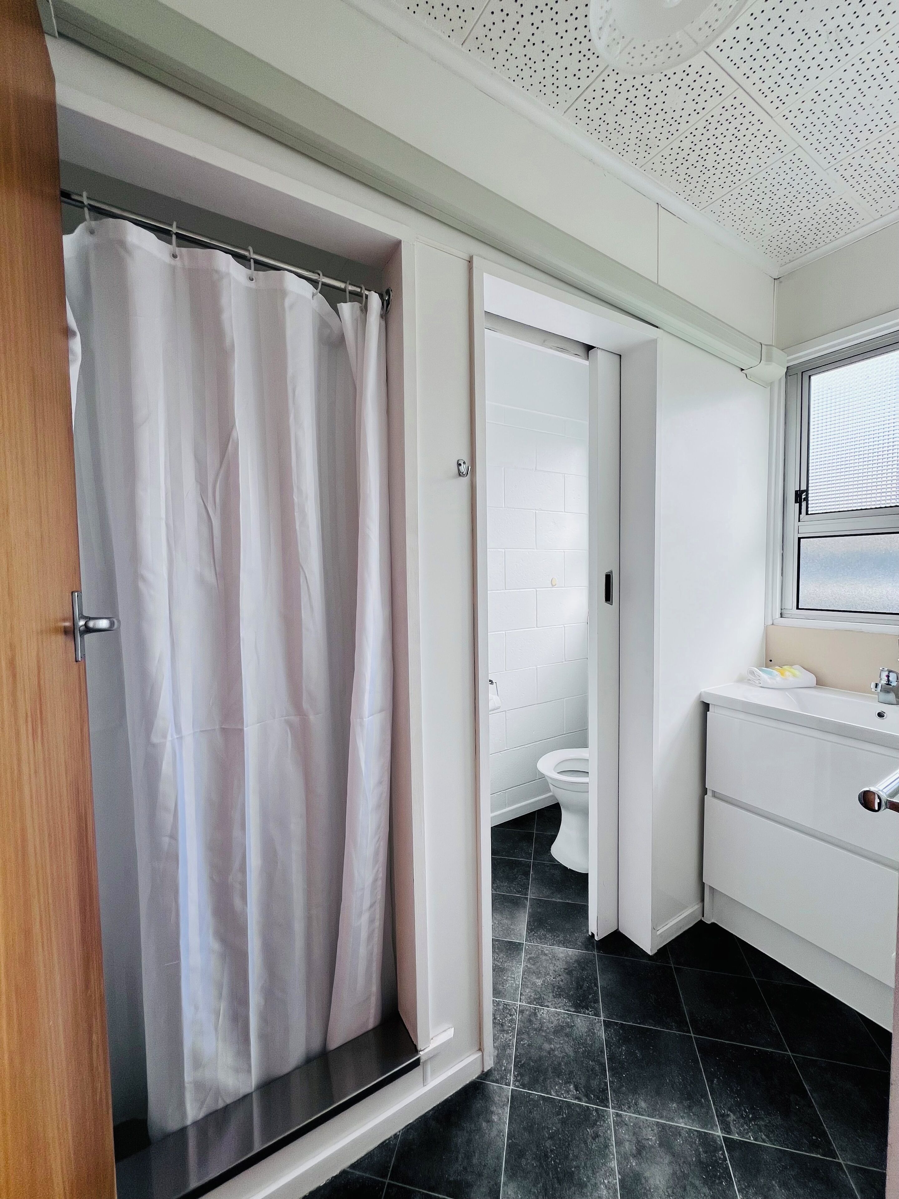Shower, free toiletries, towels, soap