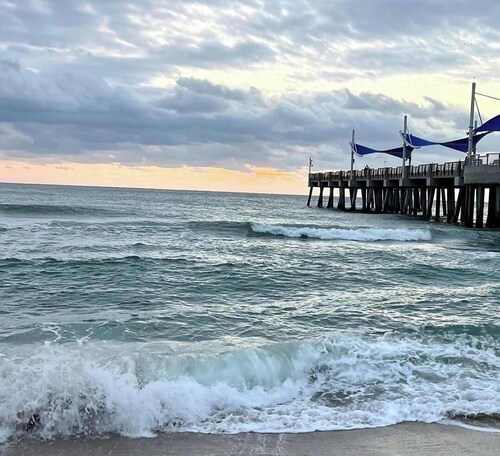 Water front condo with pool. Beautiful view. Walk to the beach. 