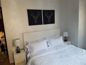 3 habitaciones, tabla de planchar con plancha y internet 