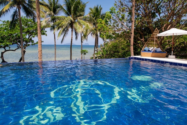 Outdoor pool, pool umbrellas, pool loungers