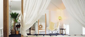 Penthouse in historic brothel, drenched in sunlight!