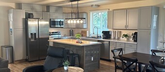 Whitefish home remodeled family friendly large yard hot tub privacy