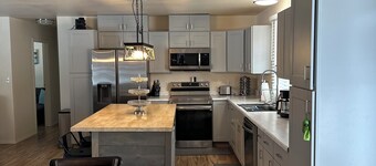 Whitefish home remodeled family friendly large yard hot tub privacy