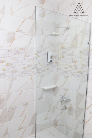 Family Room, 1 Bedroom, Non Smoking, Garden View | Bathroom | Hair dryer, bidet, towels, soap - Grand Museum Pyramids Inn (Kirdasah)