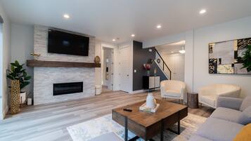 Smart TV, fireplace, foosball