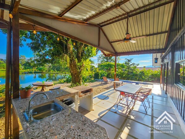 Outdoor dining - Secret Garden La Fortuna Lake View Kayak and Stand Up Paddle (La Fortuna)