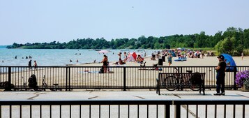 On the beach, sun loungers, beach towels