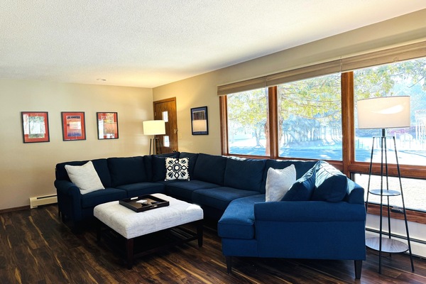 Spacious living room with seating for 8 and a smart TV