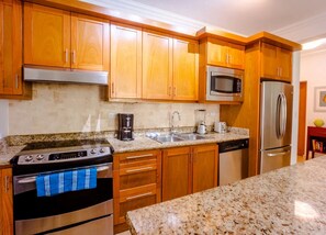 Fridge, cookware/dishes/utensils, dining tables