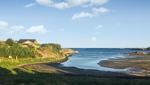 A coastal property with a house overlooking a beach and a river. - 3 bedroom awesome home in Vallda (Vallda)