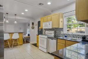 Fridge, microwave, oven, stovetop - Clean and Stylish Home- walking distance to Tulsa Expo and Route 66. (Tulsa)