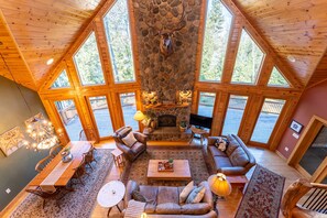TV, fireplace, books