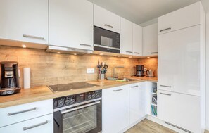 Refrigerador, microondas, parrilla de estufa y lavavajillas 