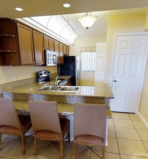 Private kitchen - Westgate Lakes Resort & Spa a prime location near world-famous theme parks in FL (Kissimmee)