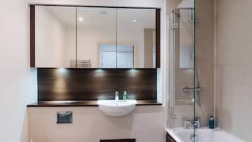 Combined shower/bathtub, hair dryer