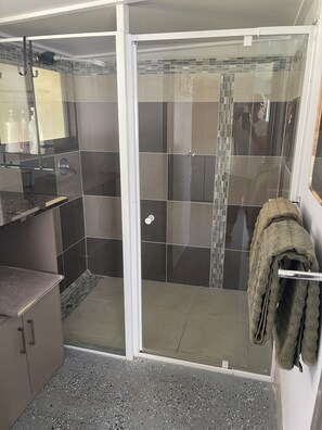 Shower, towels, soap, shampoo