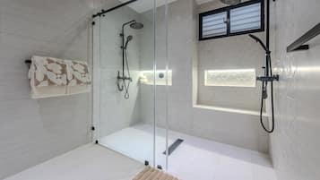 Combined shower/tub, jetted tub