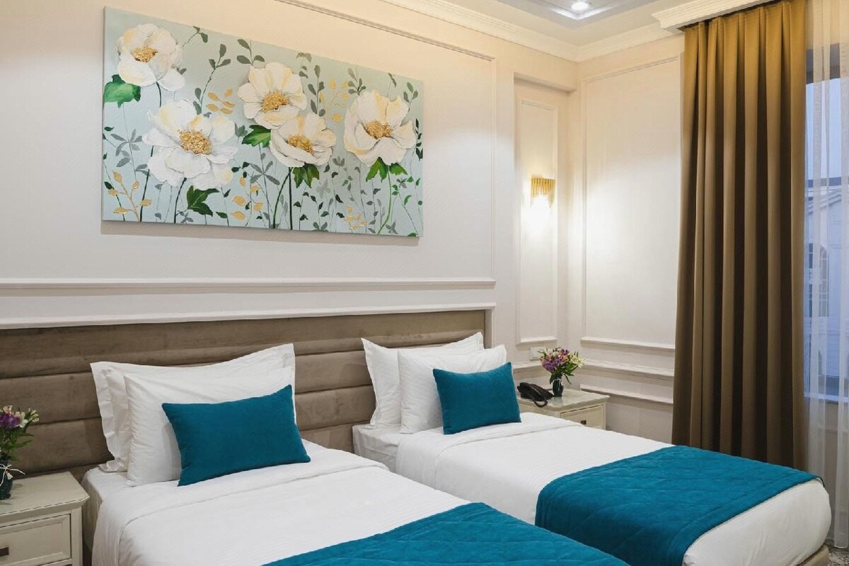 Premium bedding, down comforters, in-room safe, desk